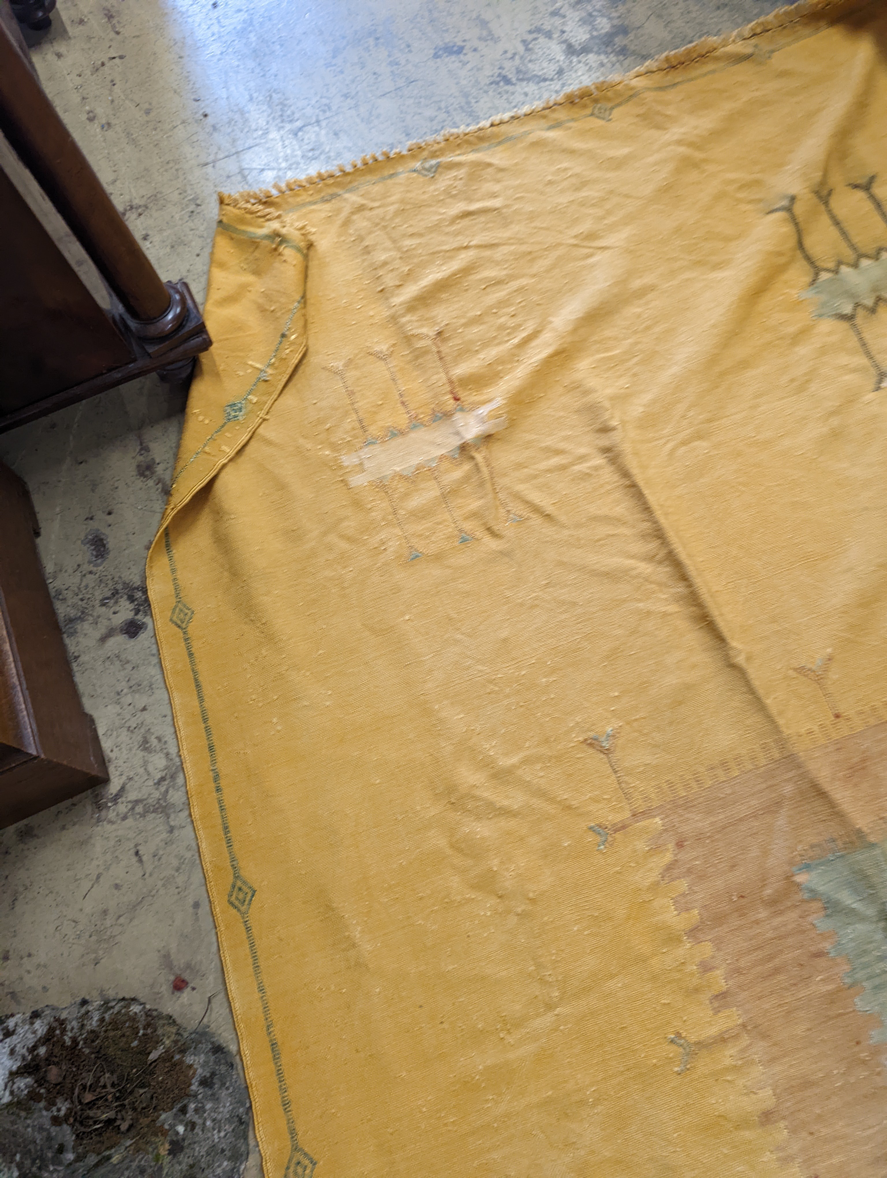 A Moroccan embroidered part silk gold ground rug, 236 x 136cm